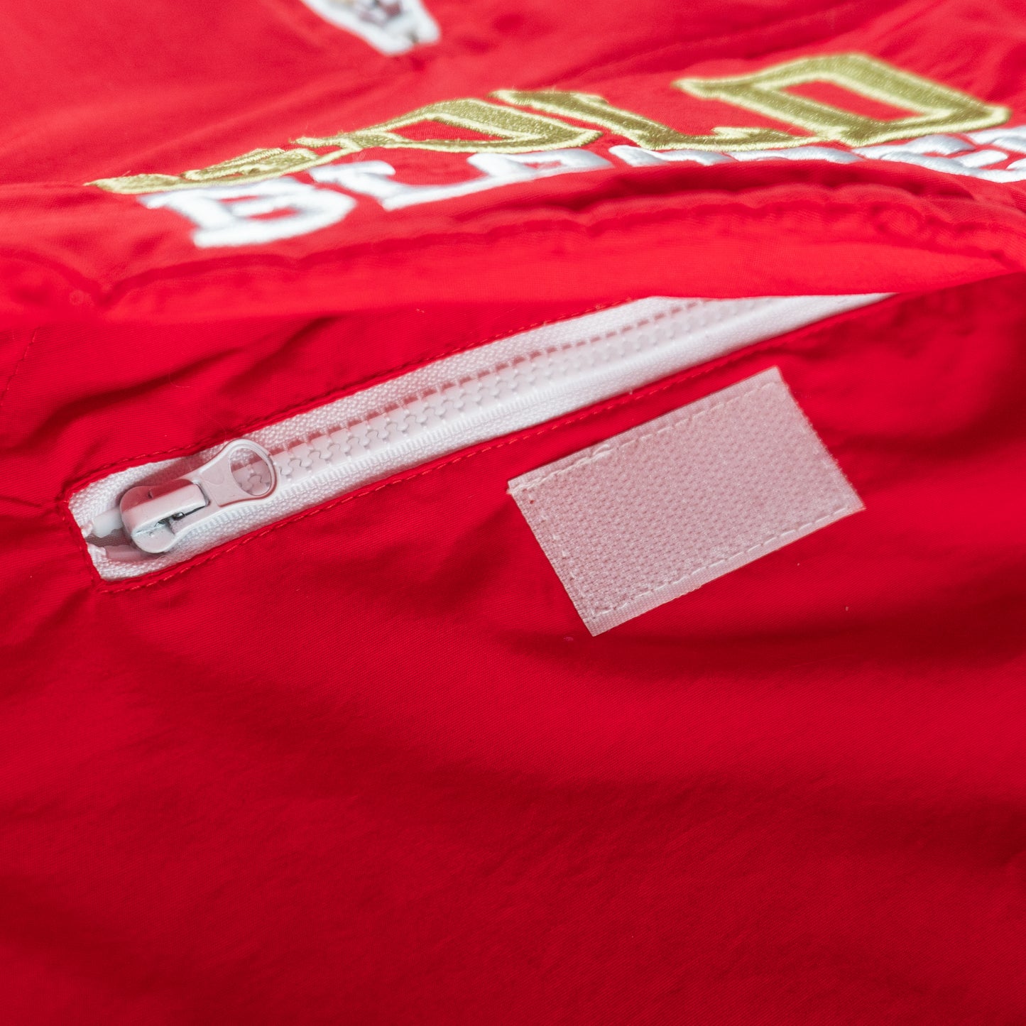 SAVS x ADAPT "GOLD BLOODED" STADIUM JACKET - RED
